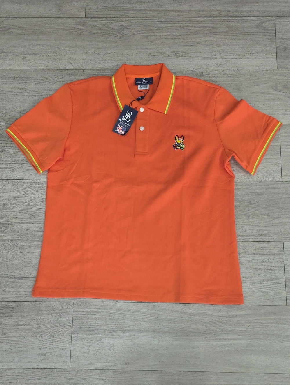 Psycho Bunny Orange Polo with Yellow Contrast Piping